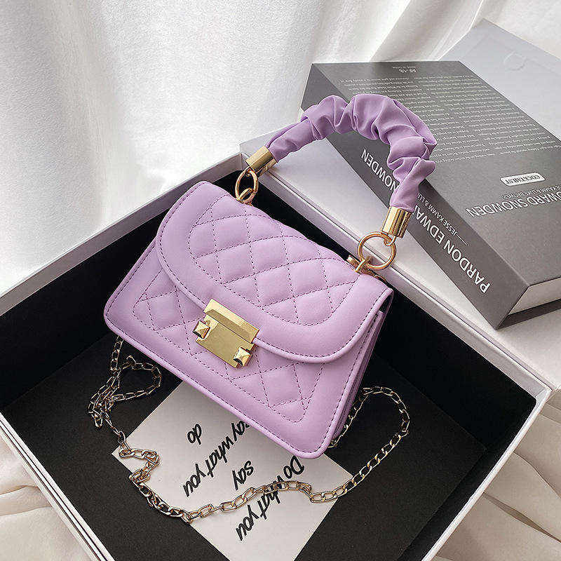 The Lyra Quilted Top-Handle Bag